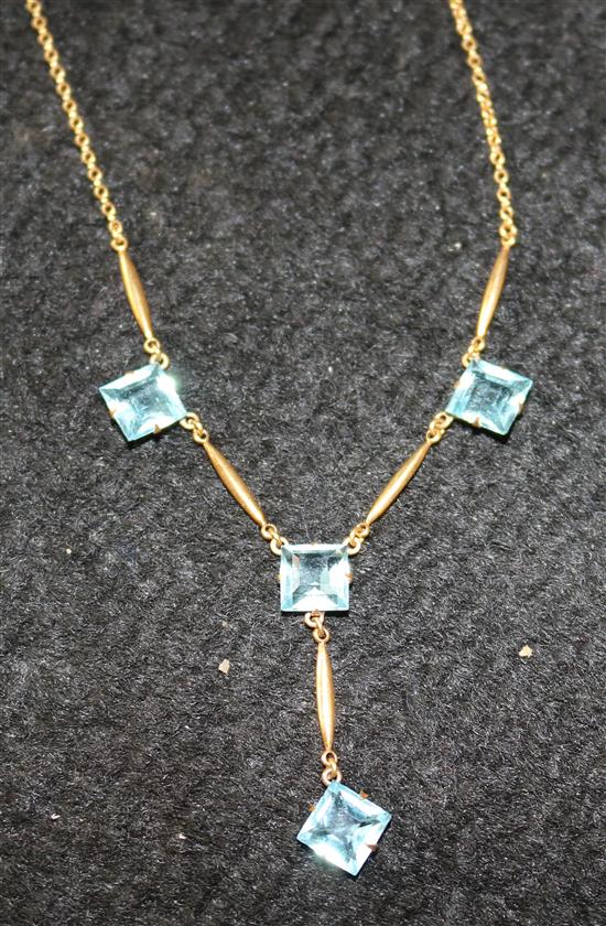 9ct gold pendant necklace set four emerald-cut aquamarines